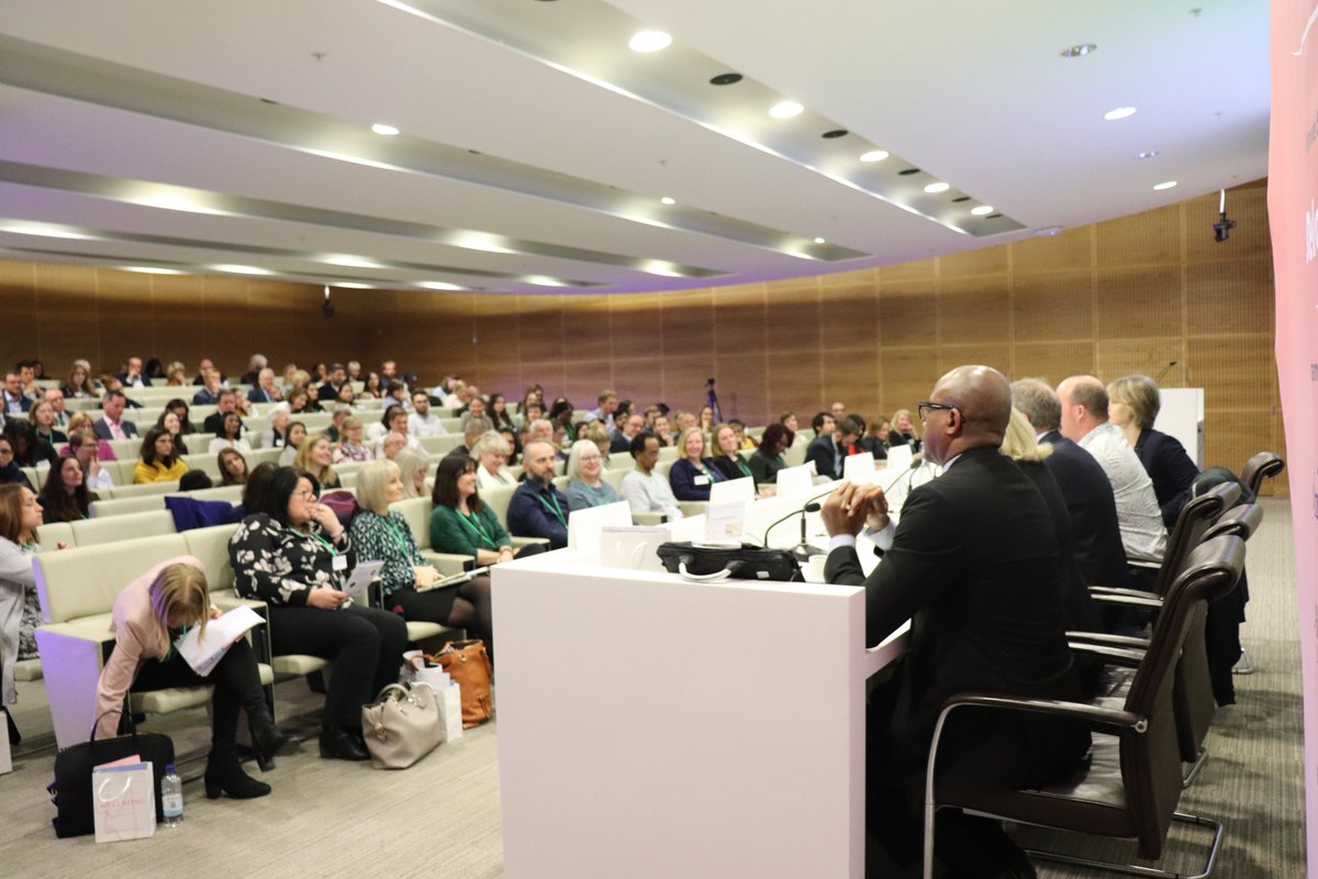 View of audience & panel at The Wellbeing Symposium